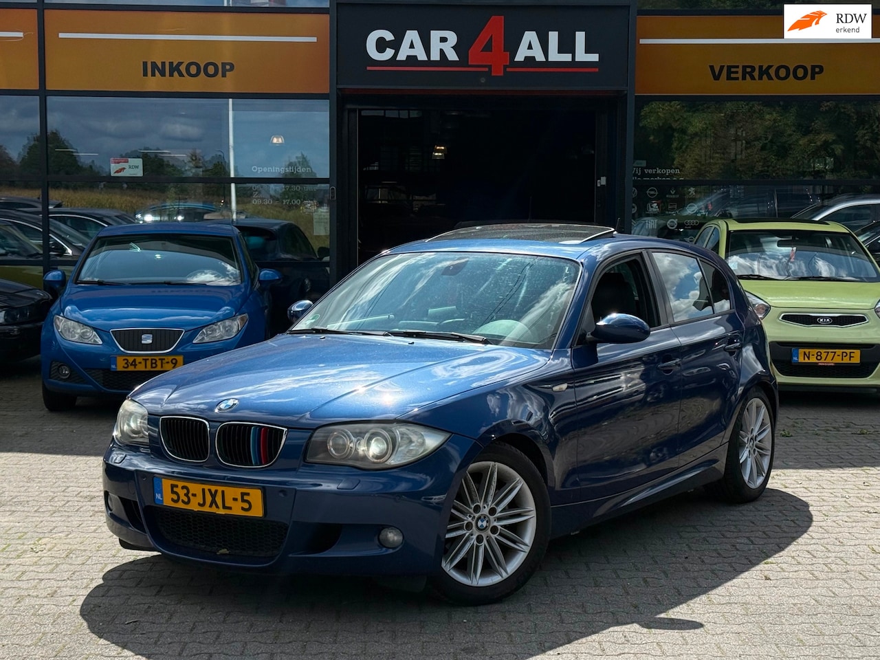 BMW 1-serie - 118i High Executive M-PAKKET/DAKJE/MEMORY/PDC/NAVI/APK 22-1-2027 - AutoWereld.nl
