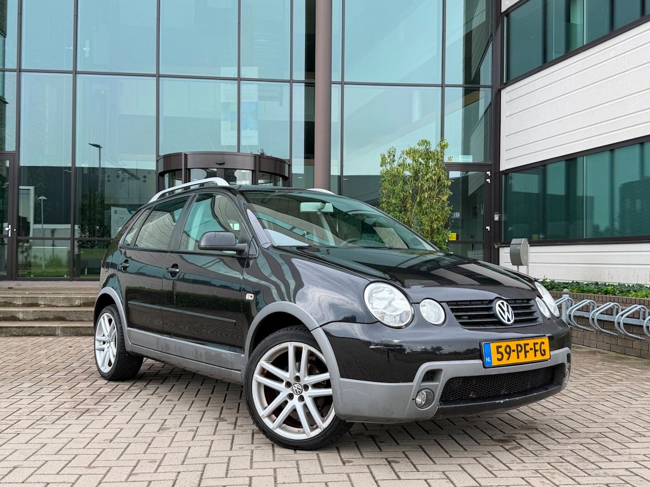Volkswagen Polo - 1.4-16V FUN | Cruise | Elektrische schuifdak - AutoWereld.nl
