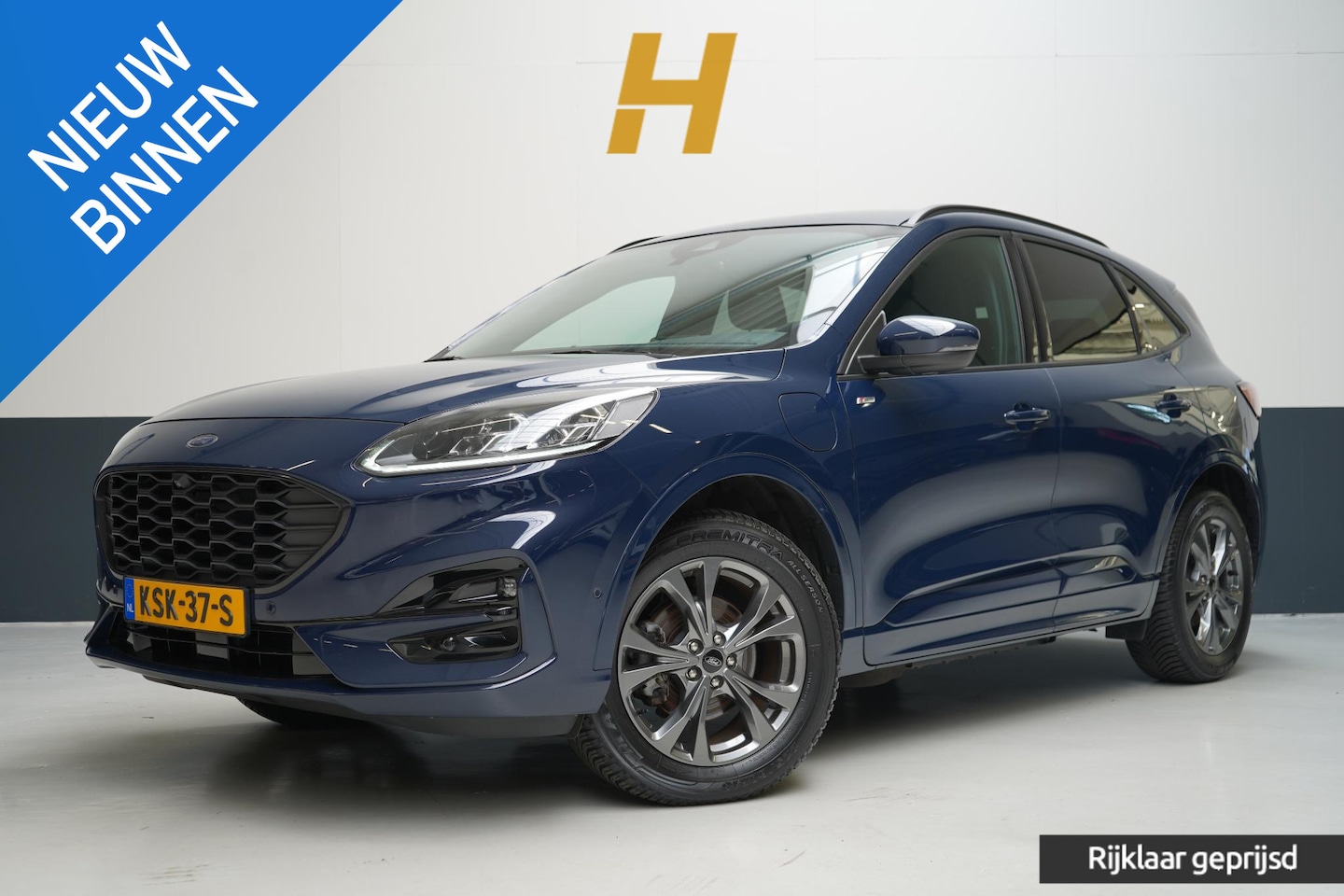 Ford Kuga - 2.5 PHEV ST-Line SoH 86,5% | Stoelverwarming | Stuurverwarming | Navigatie | Camera | Priv - AutoWereld.nl
