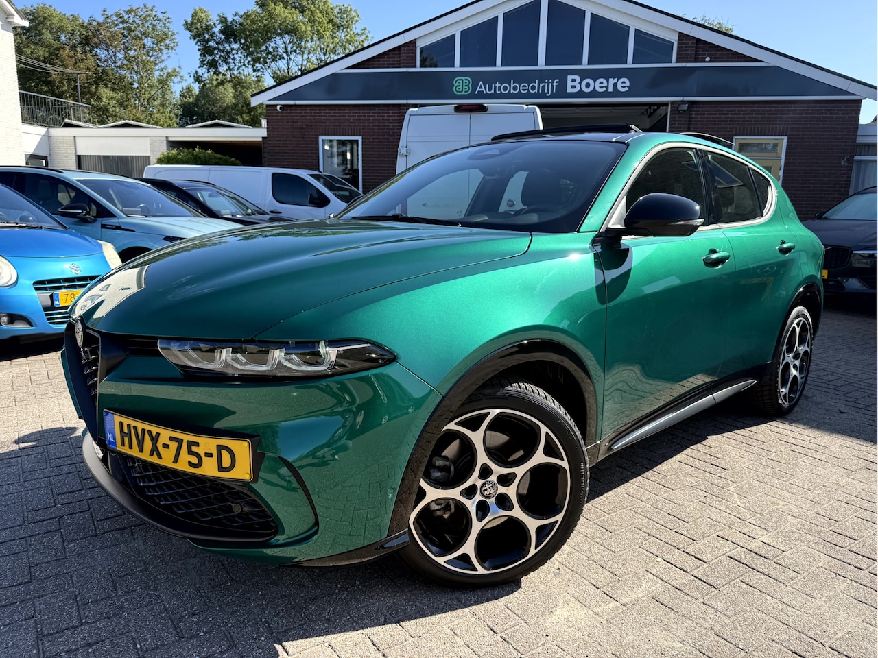 Alfa Romeo Tonale - 1.5T Hybrid Edizione Business NL.Auto, Panoramadak, Trekhaak - AutoWereld.nl