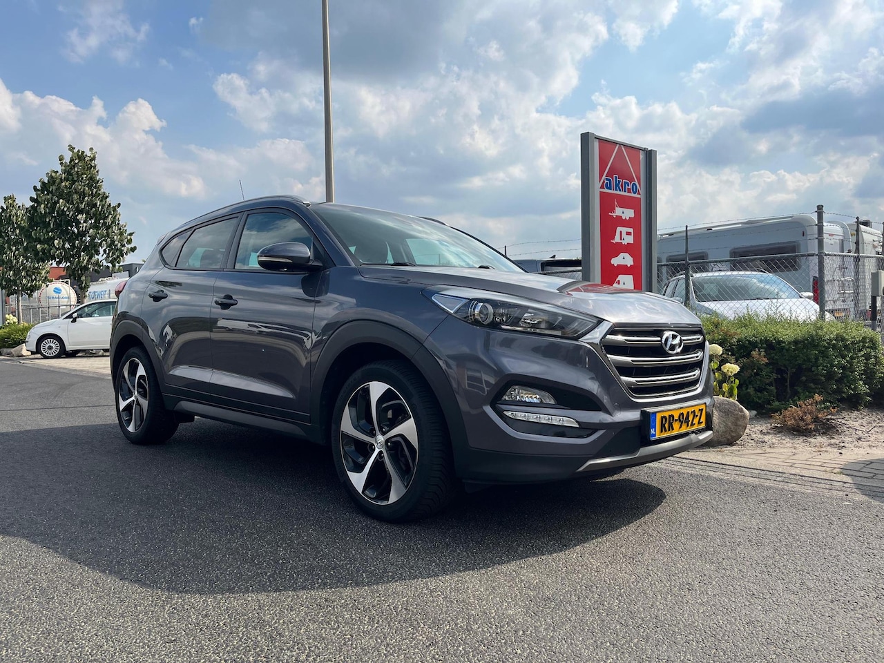 Hyundai Tucson - 2.0 CRDi Comfort | Cruise control | Airco | Achteruitrij camera | Trekhaak - AutoWereld.nl