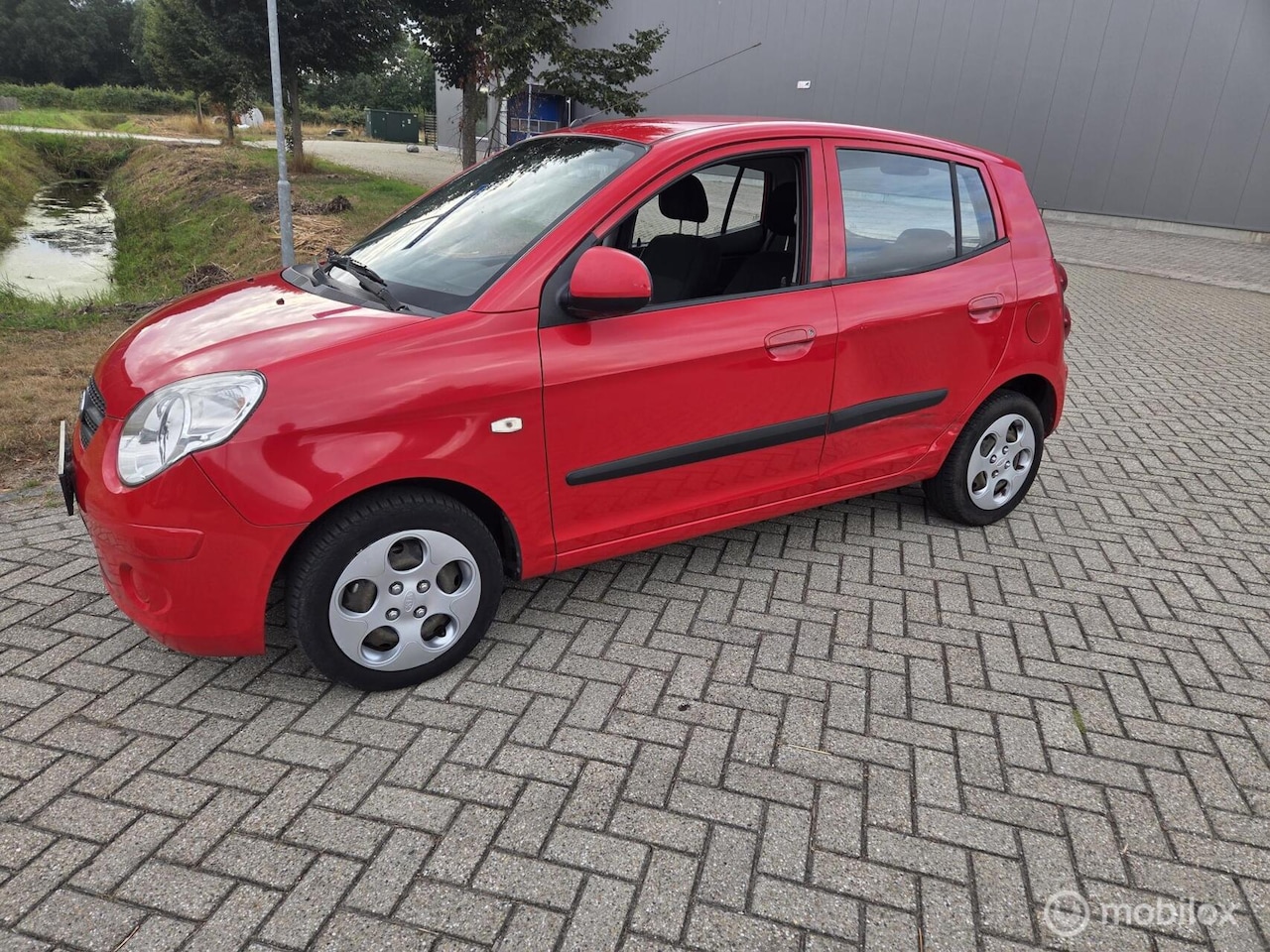 Kia Picanto - 1.1 - AutoWereld.nl