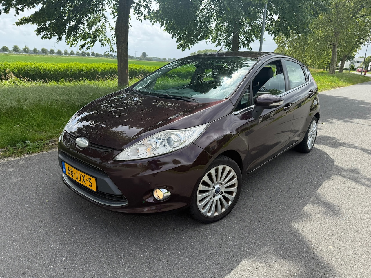 Ford Fiesta - 1.6 Titanium CLIMA/CRUISE/NAVI/LEER - AutoWereld.nl
