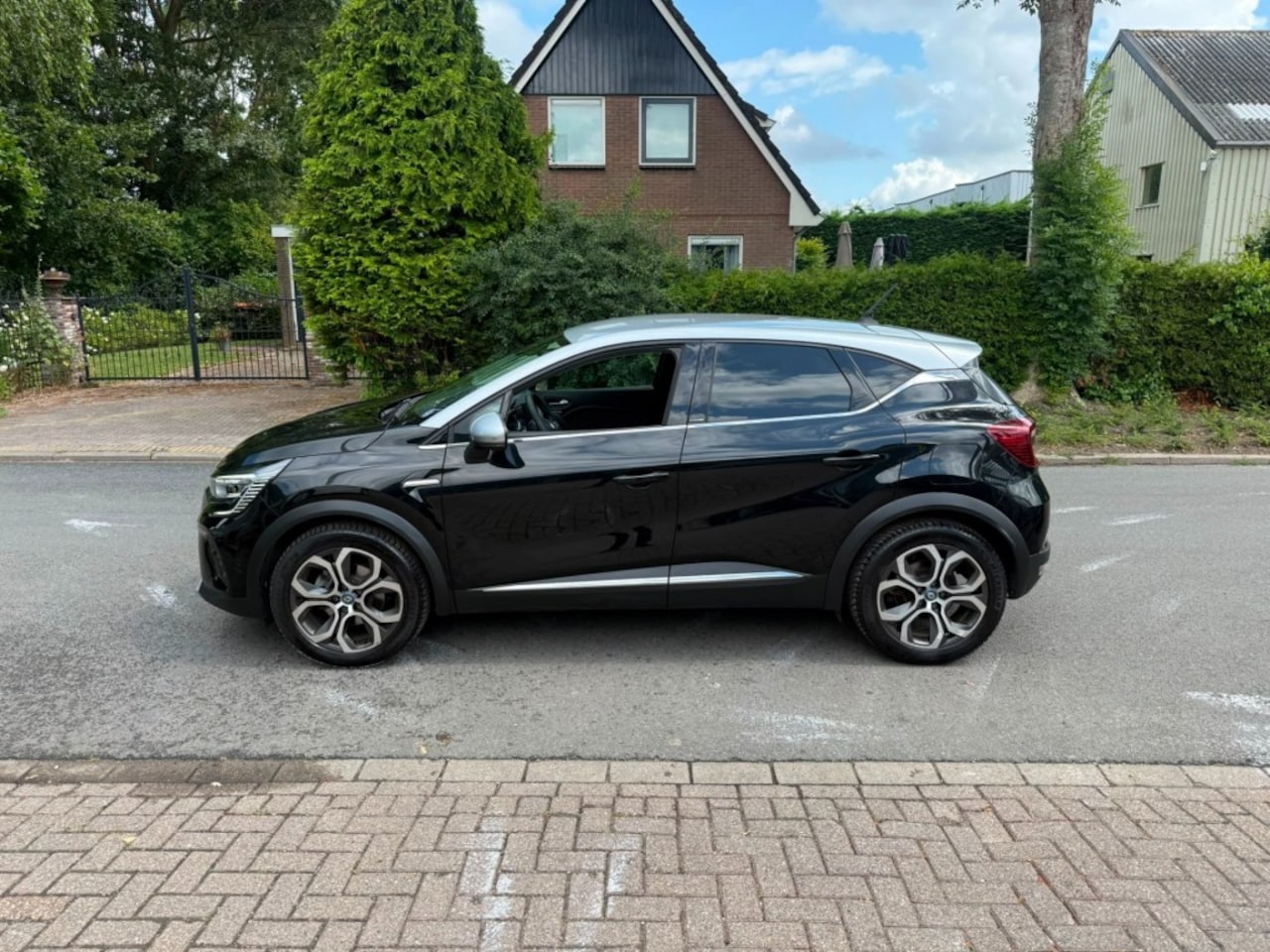 Renault Captur - 1.6 E-Tech Plug-In Hybrid 160 Intens/trekhaak/Apple carplay/android/automaat - AutoWereld.nl