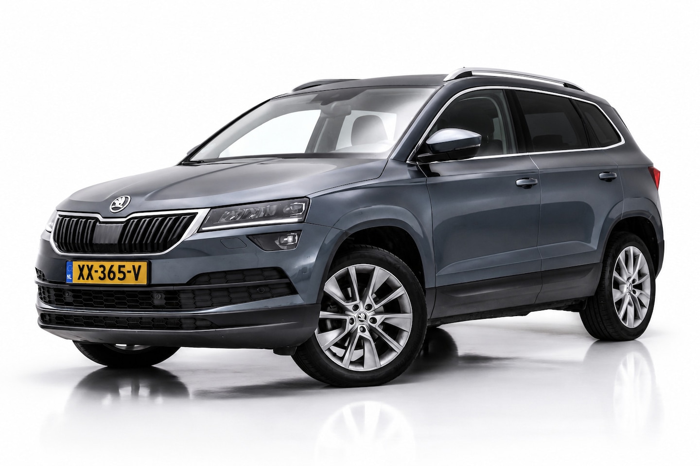 Skoda Karoq - 1.5 TSI ACT | VIRTUAL COCKPIT | STOELVERWARMING | CAMERA | NAP | CANTON | SFEERVERLICHTING - AutoWereld.nl