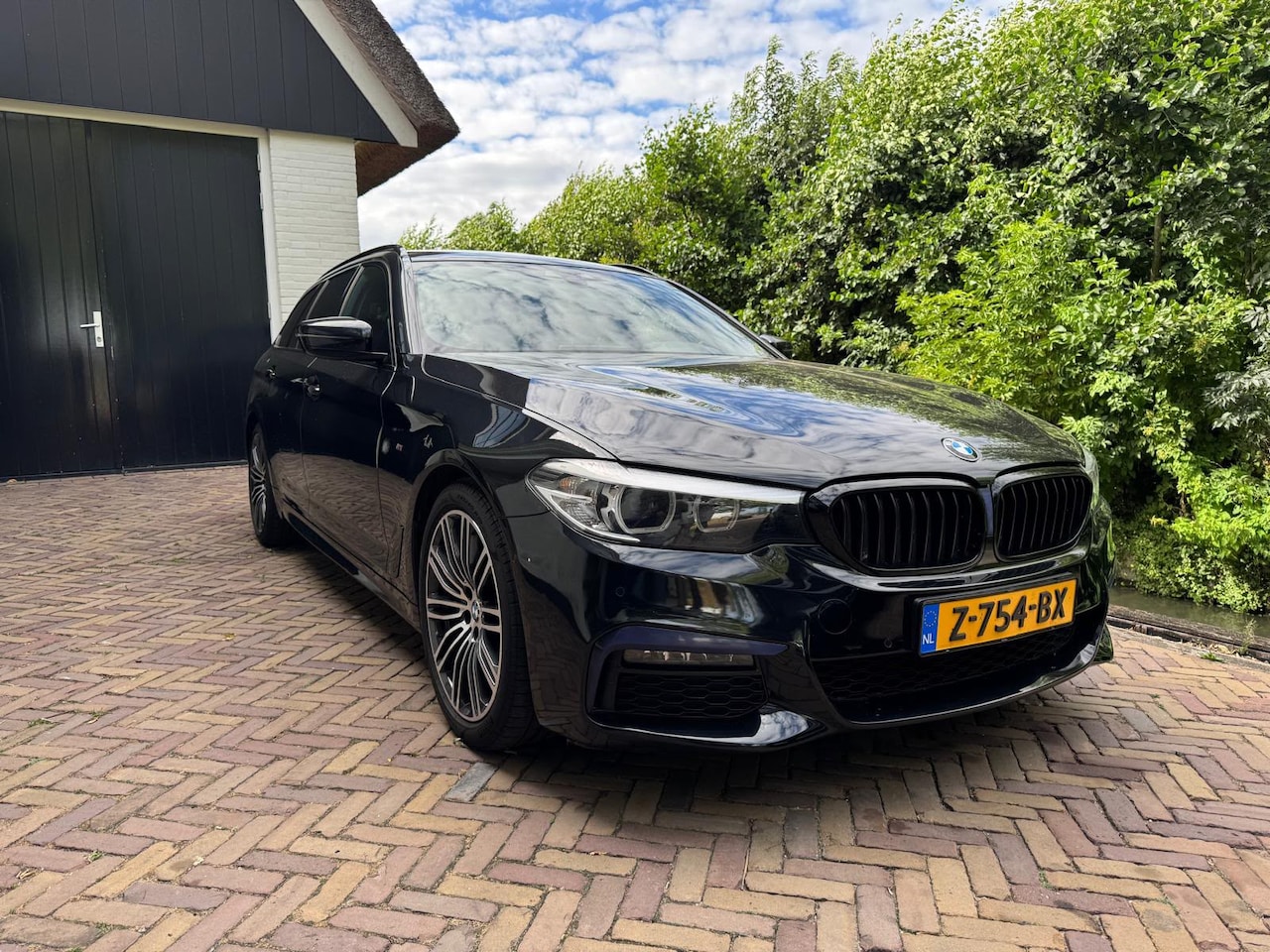 BMW 5-serie Touring - 530i High Executive Bi turbo - AutoWereld.nl