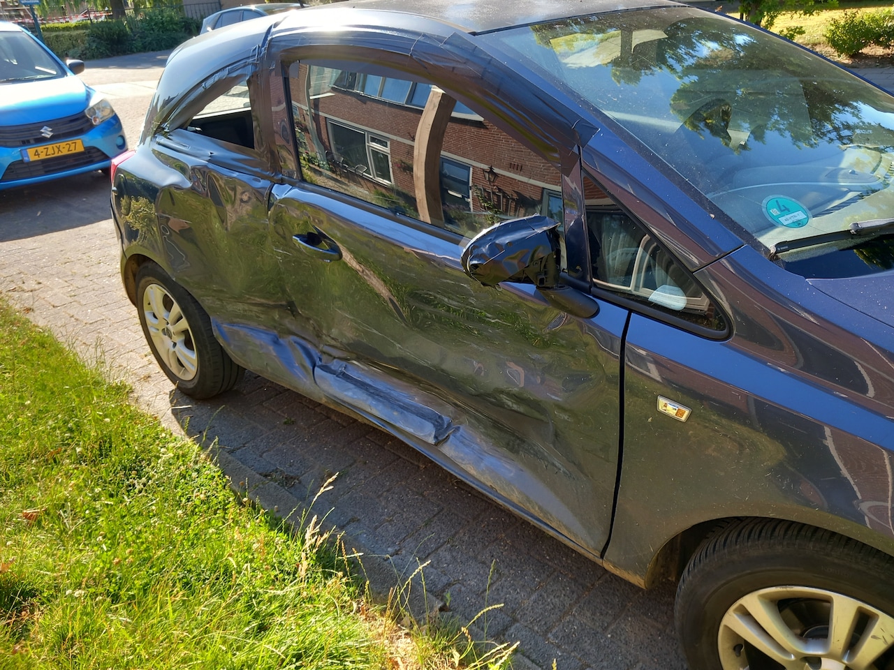 Opel Corsa - 1.4-16V Enjoy - AutoWereld.nl