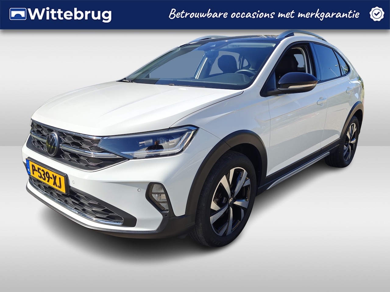 Volkswagen Taigo - 1.0 TSI Style / App-connect / Parkeersensoren / Stoelverwarming voor / Navi - AutoWereld.nl