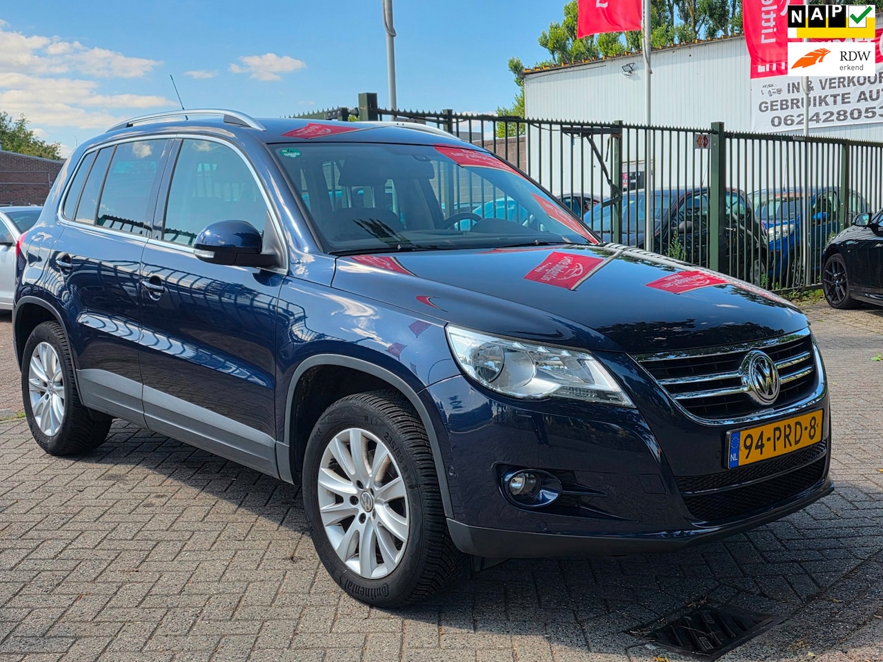 Volkswagen Tiguan - 1.4 TSI Sport&Style 1e eigenaar volledig dealer onderhouden uniek km org nl auto trekhaak - AutoWereld.nl