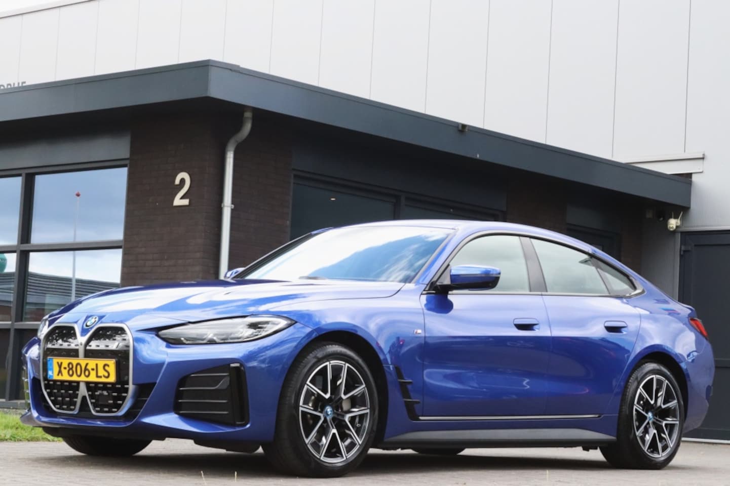 BMW i4 - eDrive40 M Sport I SOH 94% I 360° I Head Up I HK Audio - AutoWereld.nl