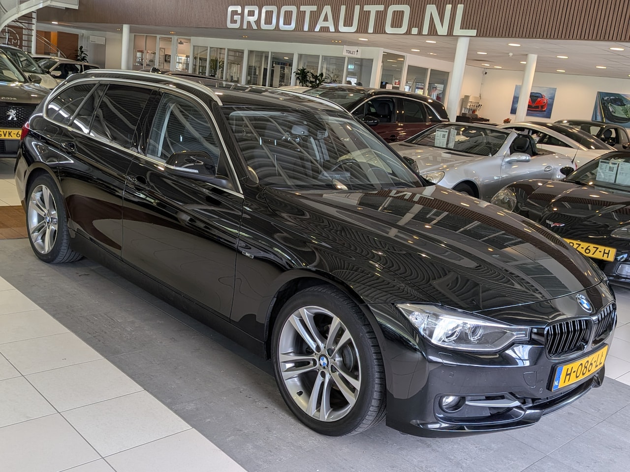 BMW 3-serie Touring - 320i High Executive Start/Stop Systeem, Cruise Control, Airco - AutoWereld.nl