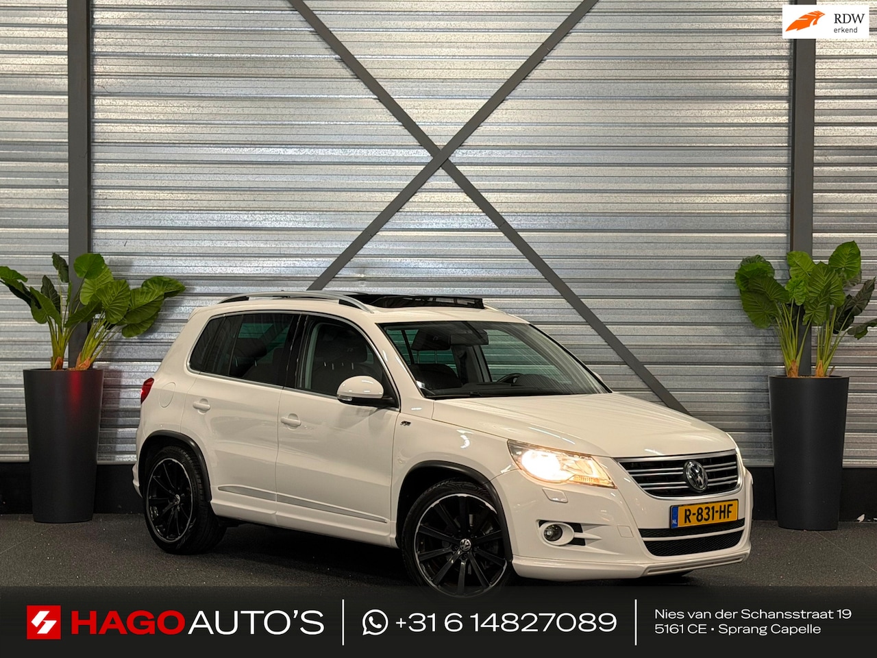 Volkswagen Tiguan - 1.4 TSI 3x R-LINE NAVI/PANO/DYNAUDIO/CRUISE/PDC/TREKHAAK/CLIMATE/STOELVERW - AutoWereld.nl