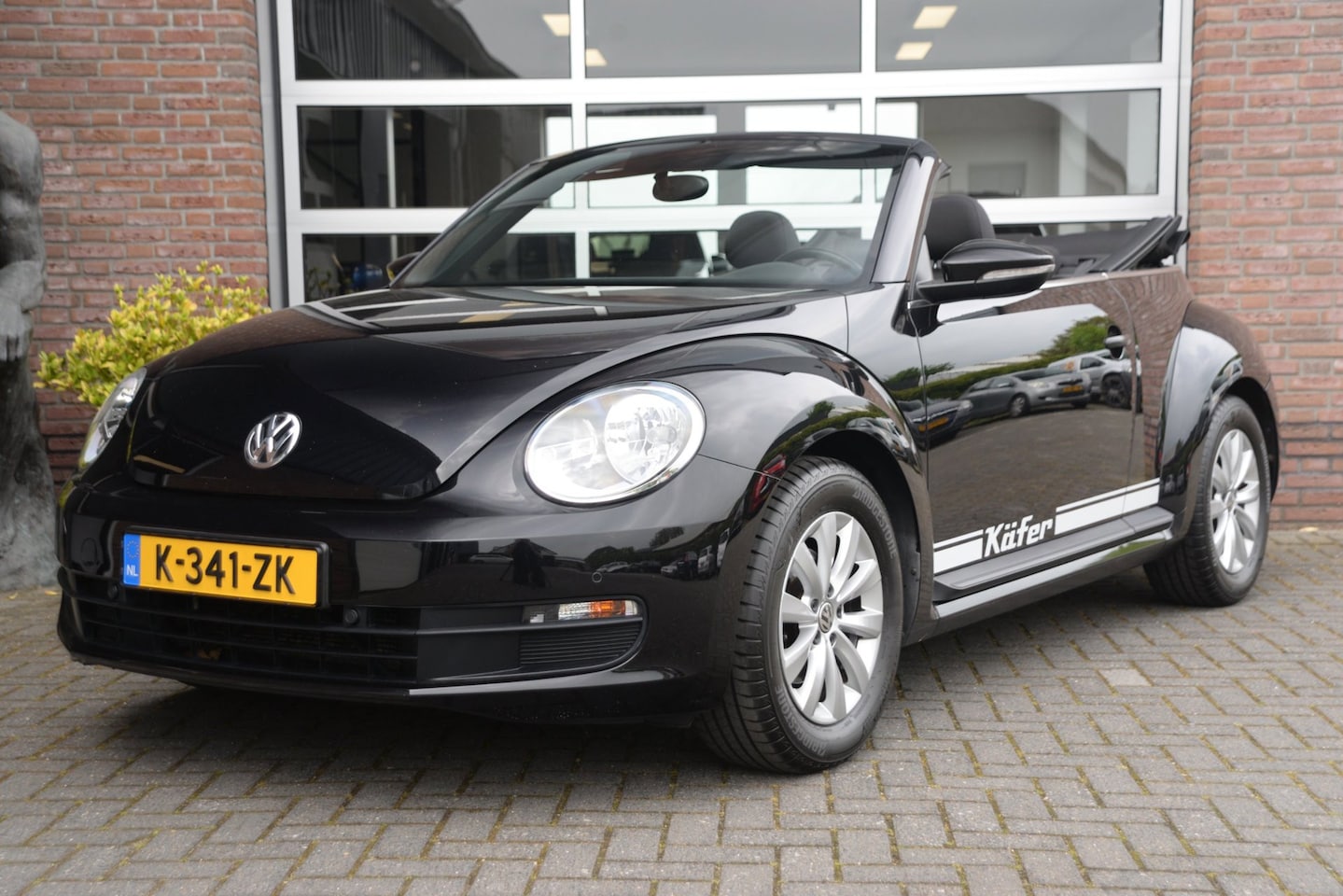 Volkswagen Beetle Cabriolet - 1.2 TSI Design | Navi | Stoelverwarming | PDC | - AutoWereld.nl