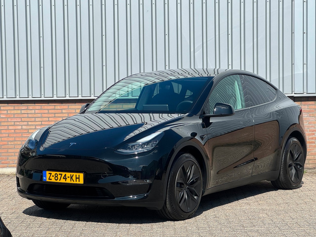 Tesla Model Y - Long Range AWD 75 kWh SOH 96,2% - AutoWereld.nl