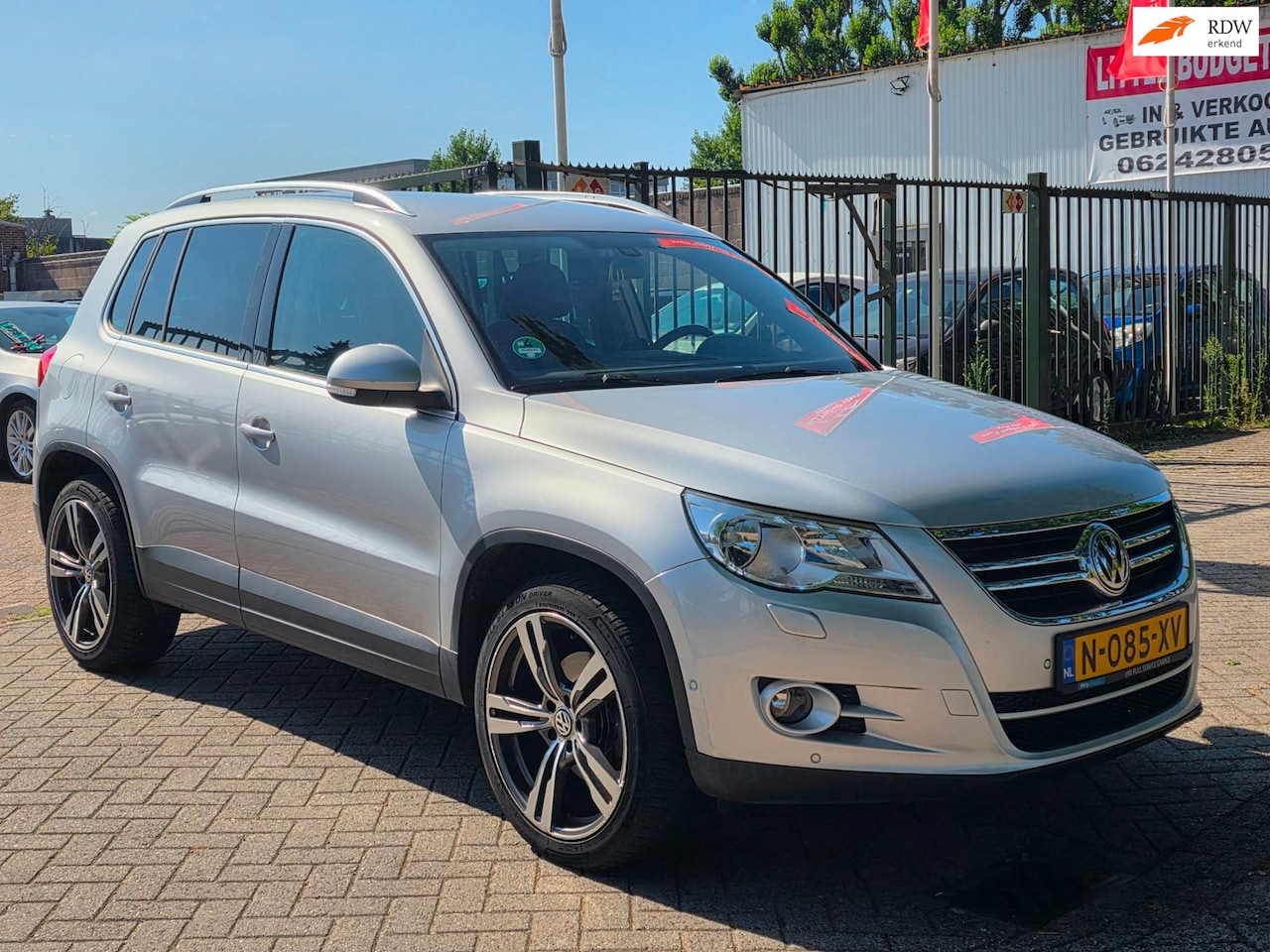 Volkswagen Tiguan - 2.0 TSI Comfort&Design 4Motion Automaat dealer onderhouden achteruit camera airco navigati - AutoWereld.nl