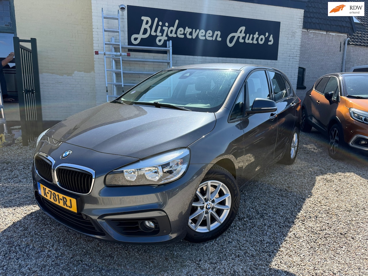 BMW 2-serie Active Tourer - 218i Centennial High Executive Automaat | Leer | Navi | Trekhaak | PDC - AutoWereld.nl