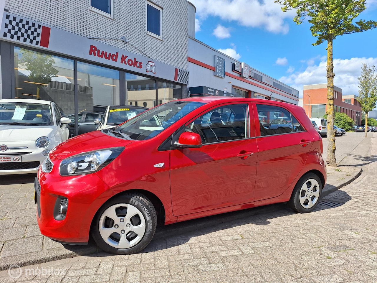 Kia Picanto - 1.0 CVVT Summer Edition 1.0 CVVT SUMMER EDITION - AutoWereld.nl