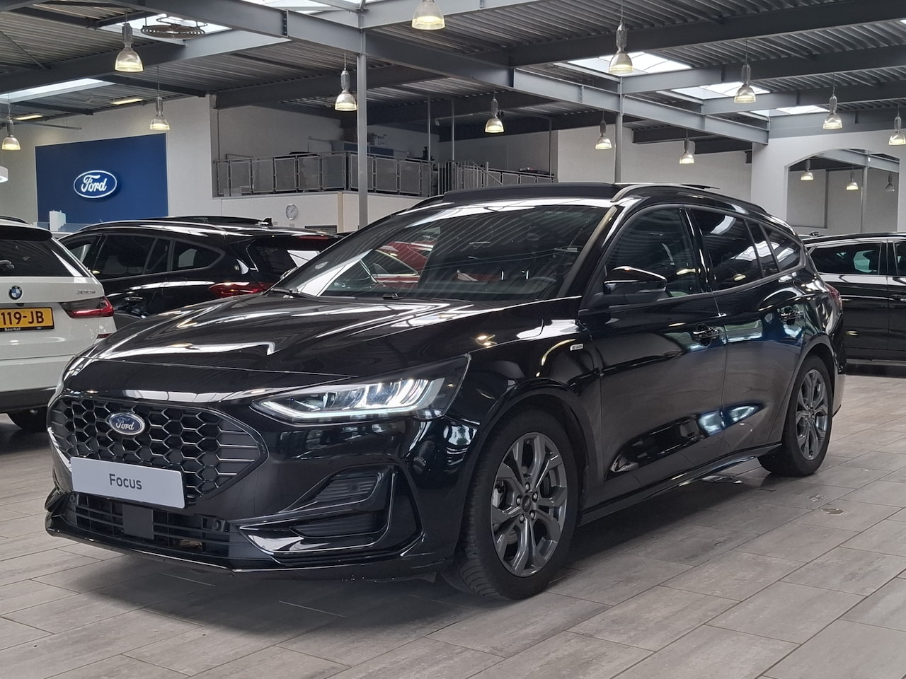 Ford Focus Wagon - EcoBoost Hybrid 155 pk ST-Line | Pano | Winterpack | Cruise control | Climate control | SY - AutoWereld.nl