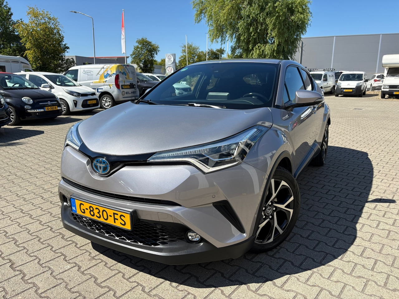 Toyota C-HR - 1.8 Hybrid Bi-Tone 1.8 Hybrid Bi-Tone, Rijklaarprijs / 12 mnd garantie - AutoWereld.nl
