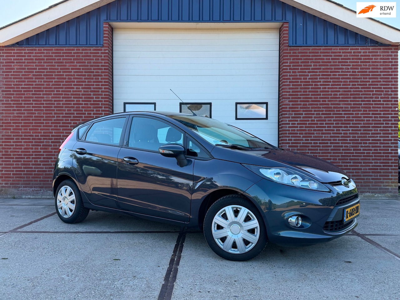 Ford Fiesta - 1.25 Titanium Champions League Airco APK Bleutooth - AutoWereld.nl