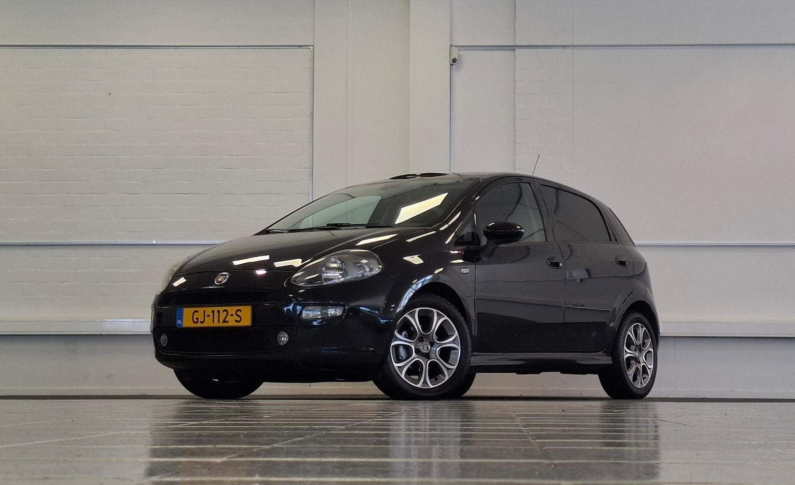 Fiat Punto Evo - 0.9 TwinAir Lounge Panoramadak Clima Garantie Mooi! - AutoWereld.nl