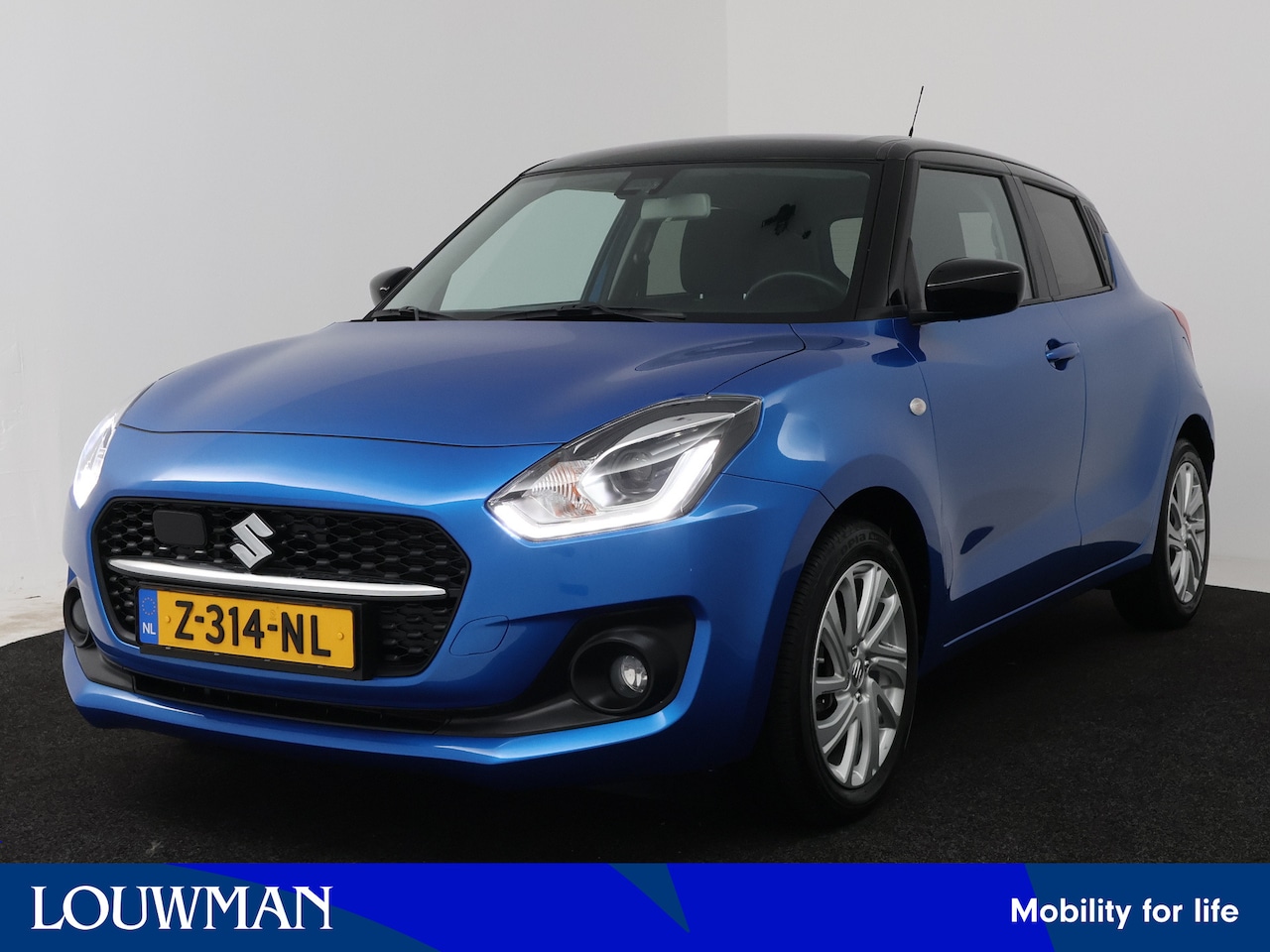 Suzuki Swift - 1.2 Select Smart Hybrid | Stoelverwarming | Apple Carplay/Android Auto | LM Velgen | - AutoWereld.nl