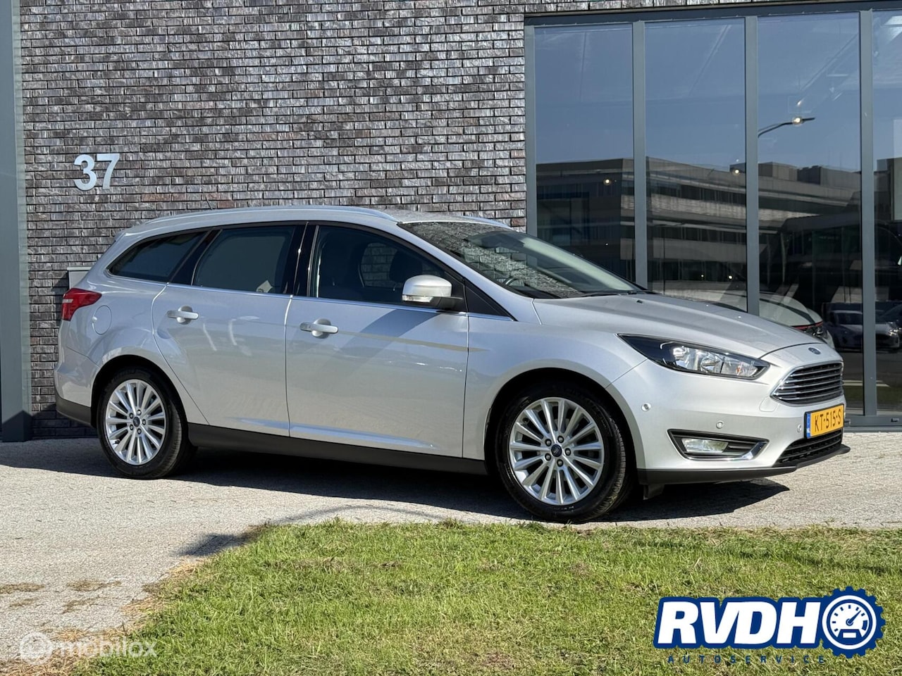 Ford Focus Wagon - 1.0 Titanium |Clima|Cruise|Carplay - AutoWereld.nl