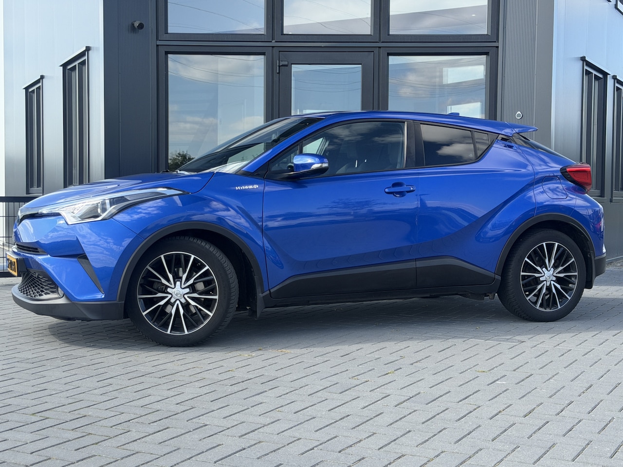Toyota C-HR - 1.8 Hybrid Active Clima | Cruise | Camera | Super netjes - AutoWereld.nl