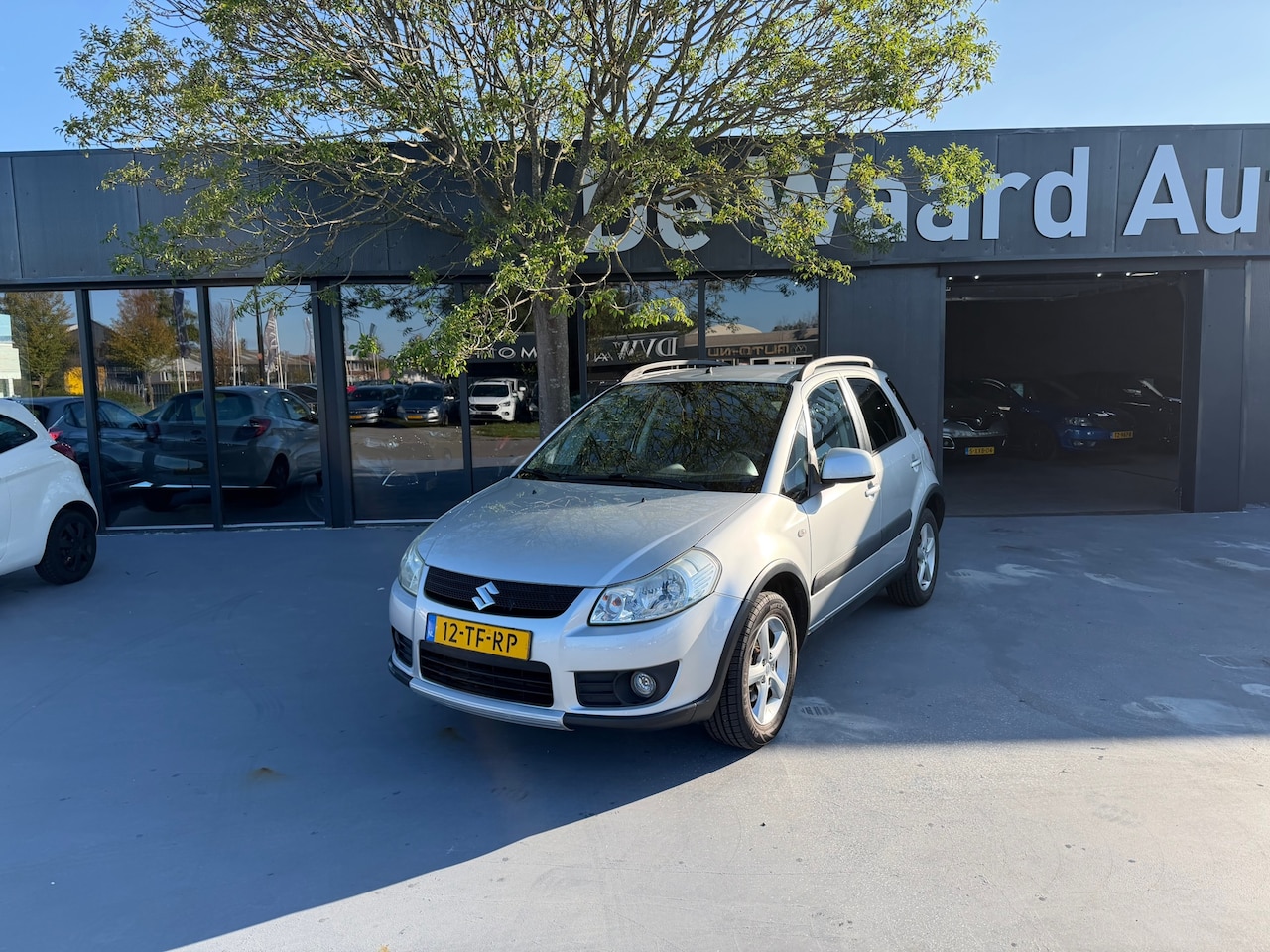 Suzuki SX4 - 1.6 4Grip Exclusive/ 4x4/airco/ NAP/1e eigenaar/Goed onderhouden/6 maanden garantie - AutoWereld.nl