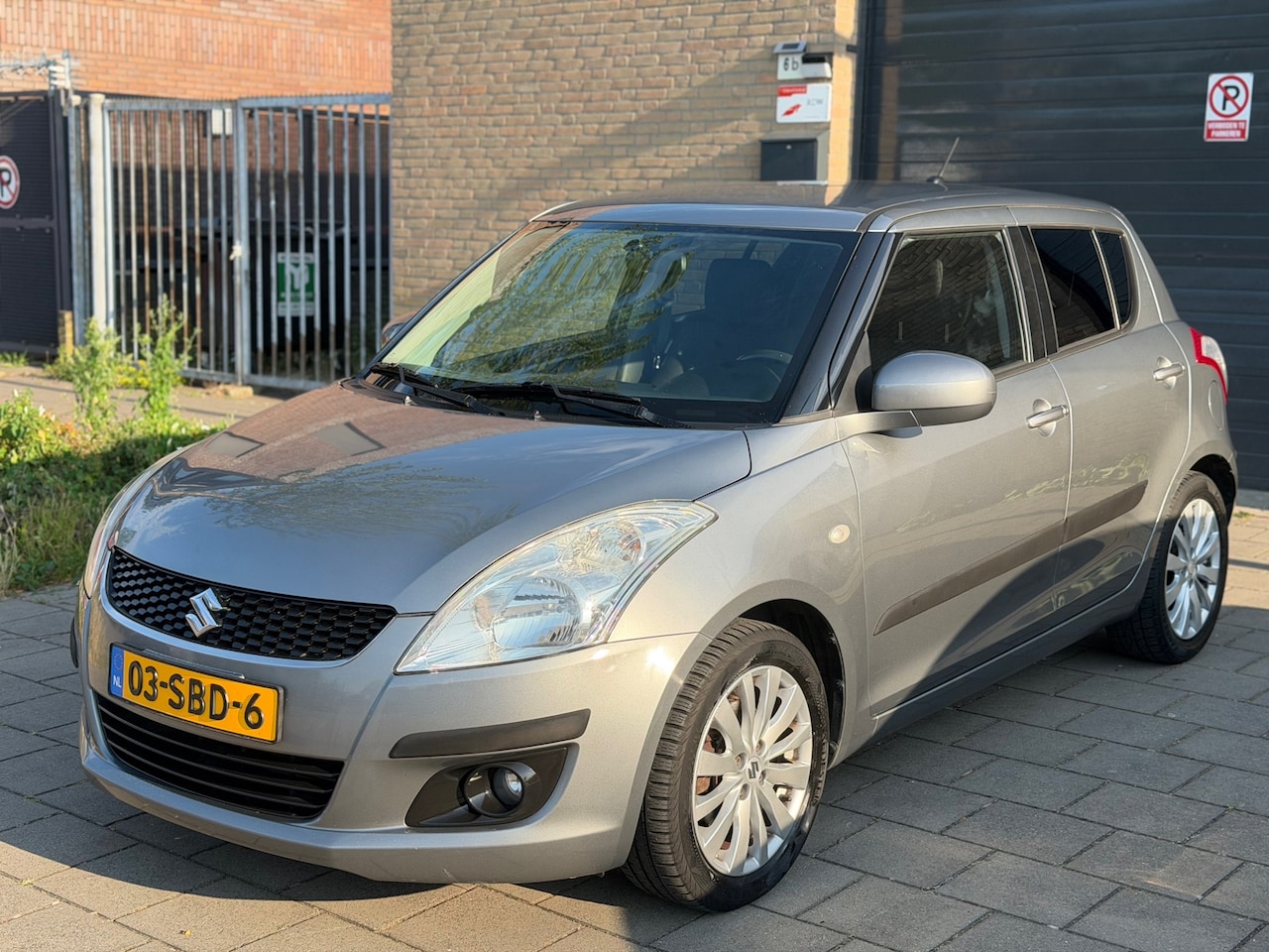 Suzuki Swift - 1.2 Bandit EASSS Keyless Cruise Control Clima Stoelverw. electr.pakket LMvelgen - AutoWereld.nl