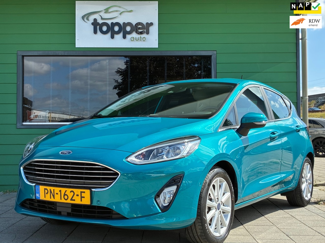 Ford Fiesta - 1.0 EcoBoost Titanium|1e Eigenaar|Camera|Navigatie|CruiseControl|Climatronic|Trekhaak|NAP| - AutoWereld.nl