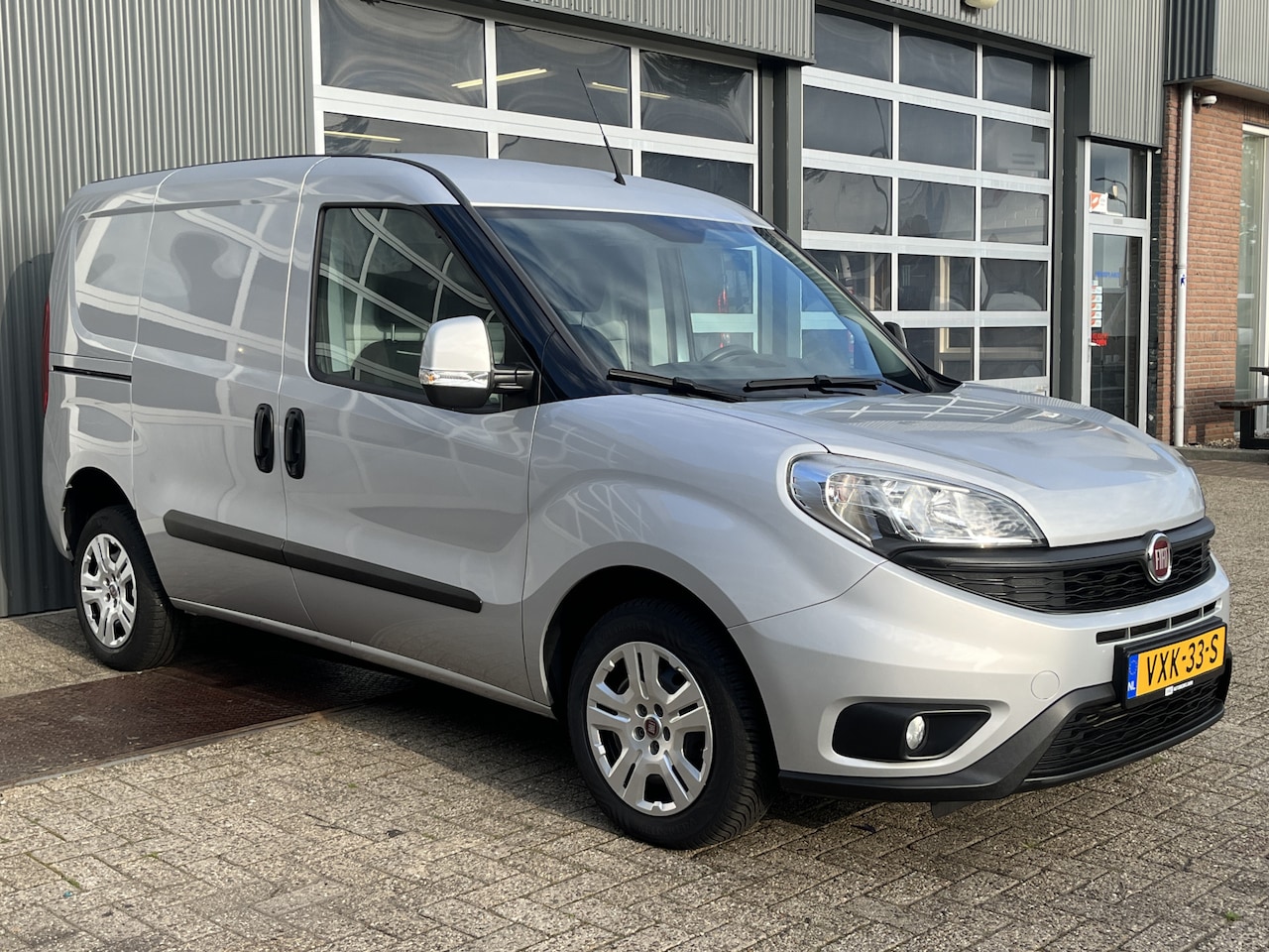 Fiat Doblò Cargo - 1.3 MJ L1H1 SX Btw en Bpm vrij Airco Cruise controle Navigatie Tussenschot Parkeerhulp ach - AutoWereld.nl