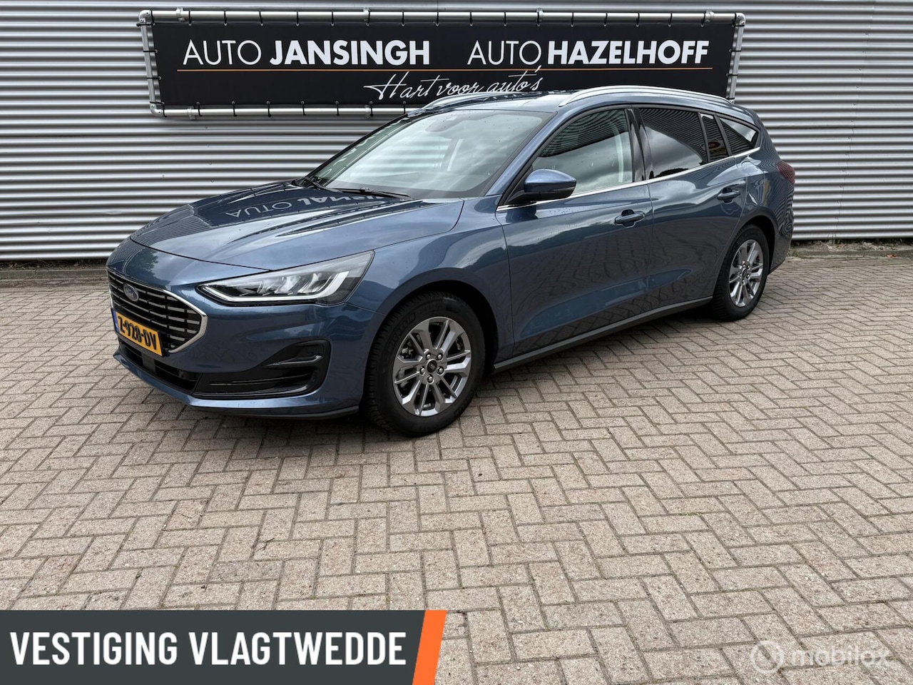 Ford Focus Wagon - 1.0 EcoBoost Hybrid Titanium | Clima | PDC V+A | Navi | Privacy Glas | Cruise | Led | - AutoWereld.nl