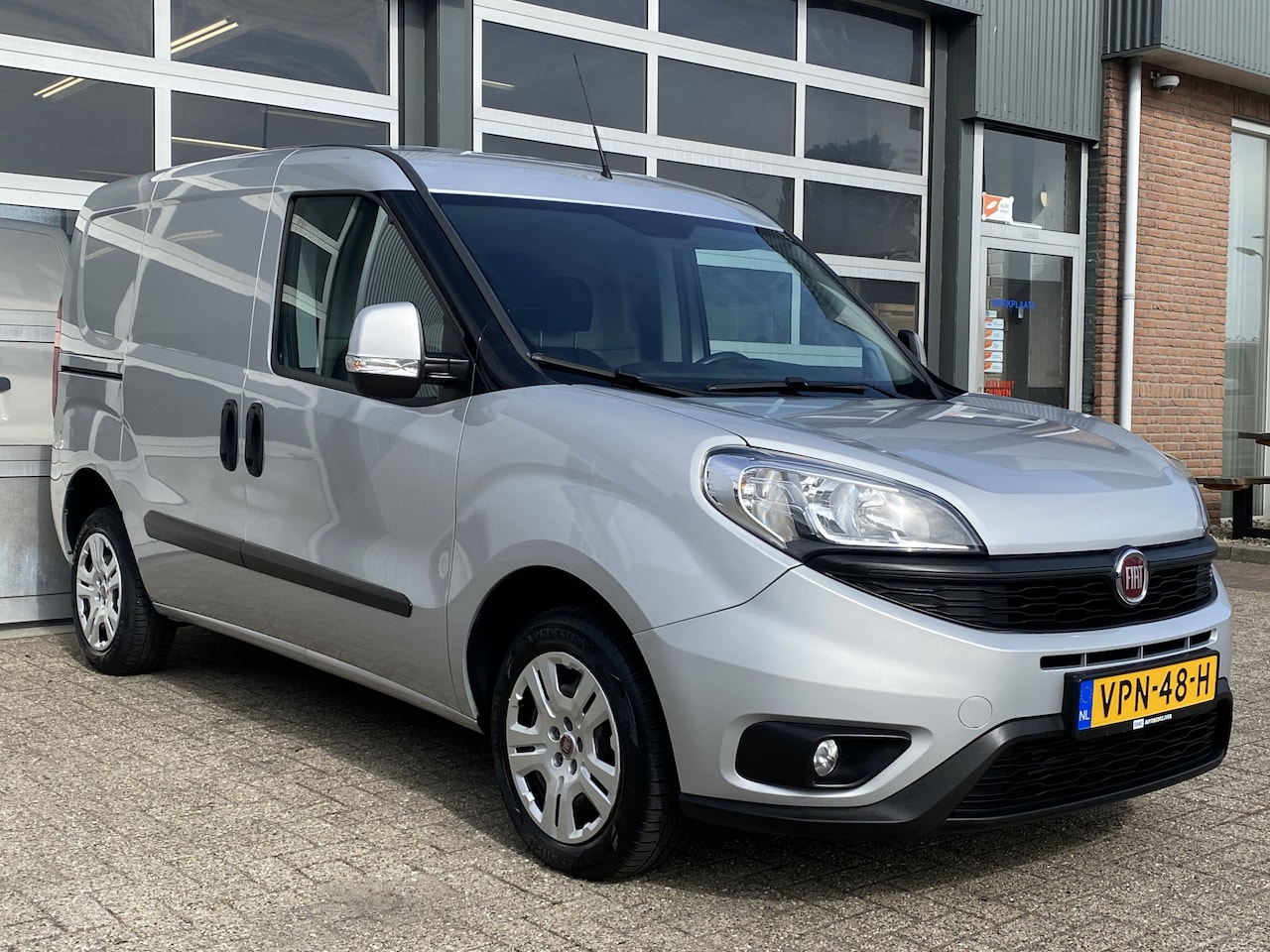 Fiat Doblò Cargo - 1.3 MJ L1H1 SX Btw en Bpm vrij Airco Cruise controle Navigatie Tussenschot Parkeerhulp ach - AutoWereld.nl