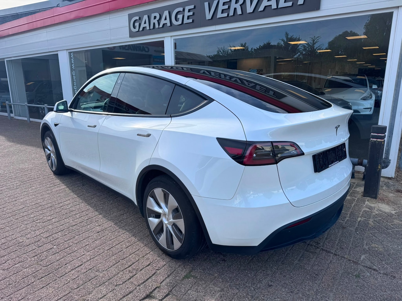 Tesla Model Y - RWD 58 kWh RWD 58 kWh - AutoWereld.nl