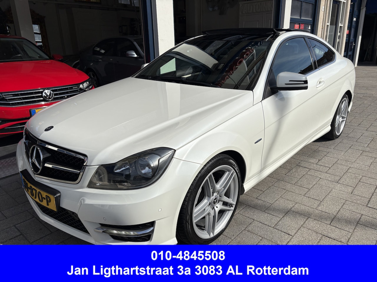 Mercedes-Benz C-klasse Coupé - 180 Ambition AMG/PANORAMA/LEDER/TOPSTAAT - AutoWereld.nl