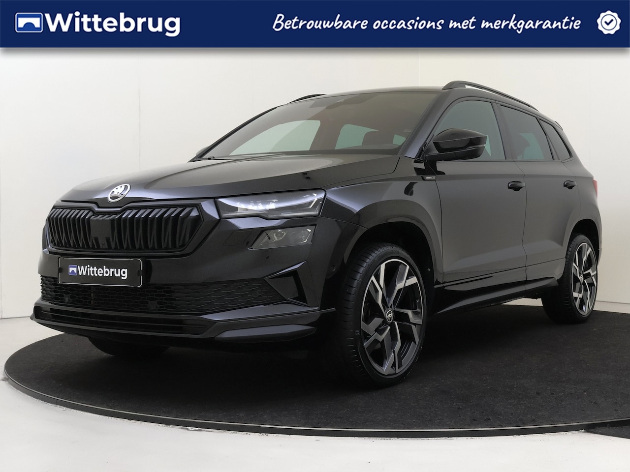Skoda Karoq - 1.5 TSI 150PK ACT Sportline Business Schuif / kantel dak | Camera | Parkeerhulp | Apple ca - AutoWereld.nl