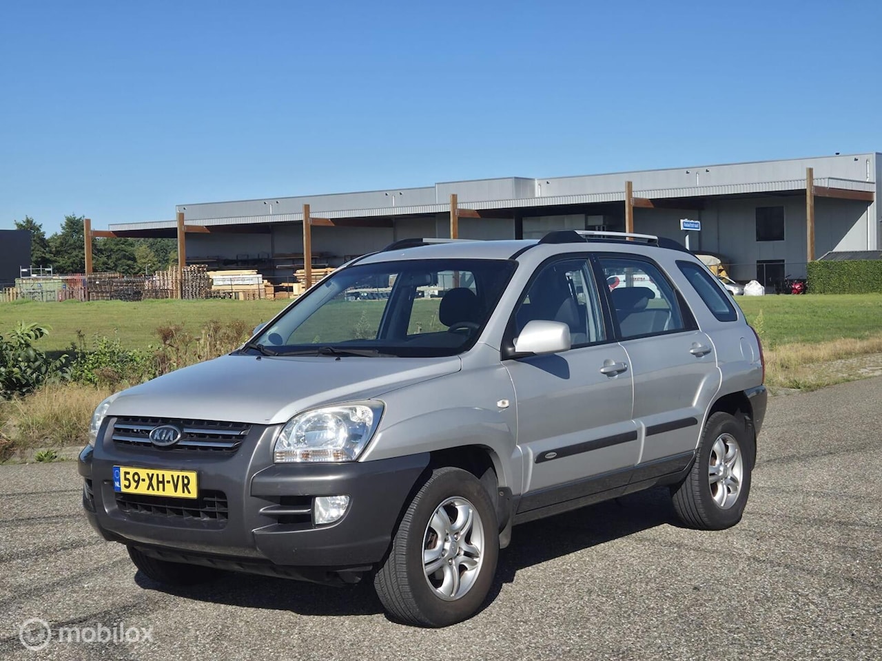Kia Sportage - 2.0 CVVT Comfort Airco / Cruise / Trekhaak - AutoWereld.nl