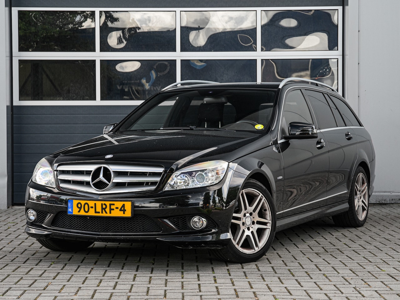 Mercedes-Benz C-klasse Estate - 180 CGI Avantgarde | AMG-pakket | Automaat | Navi | Climate control | PDC v+a | Half leder - AutoWereld.nl