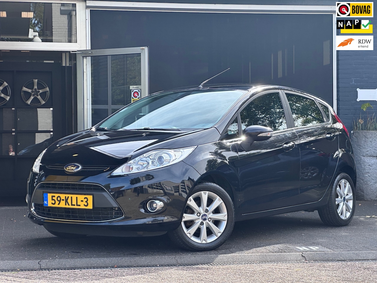 Ford Fiesta - 1.6 Ghia CLIMA / CRUISE / NAP - AutoWereld.nl