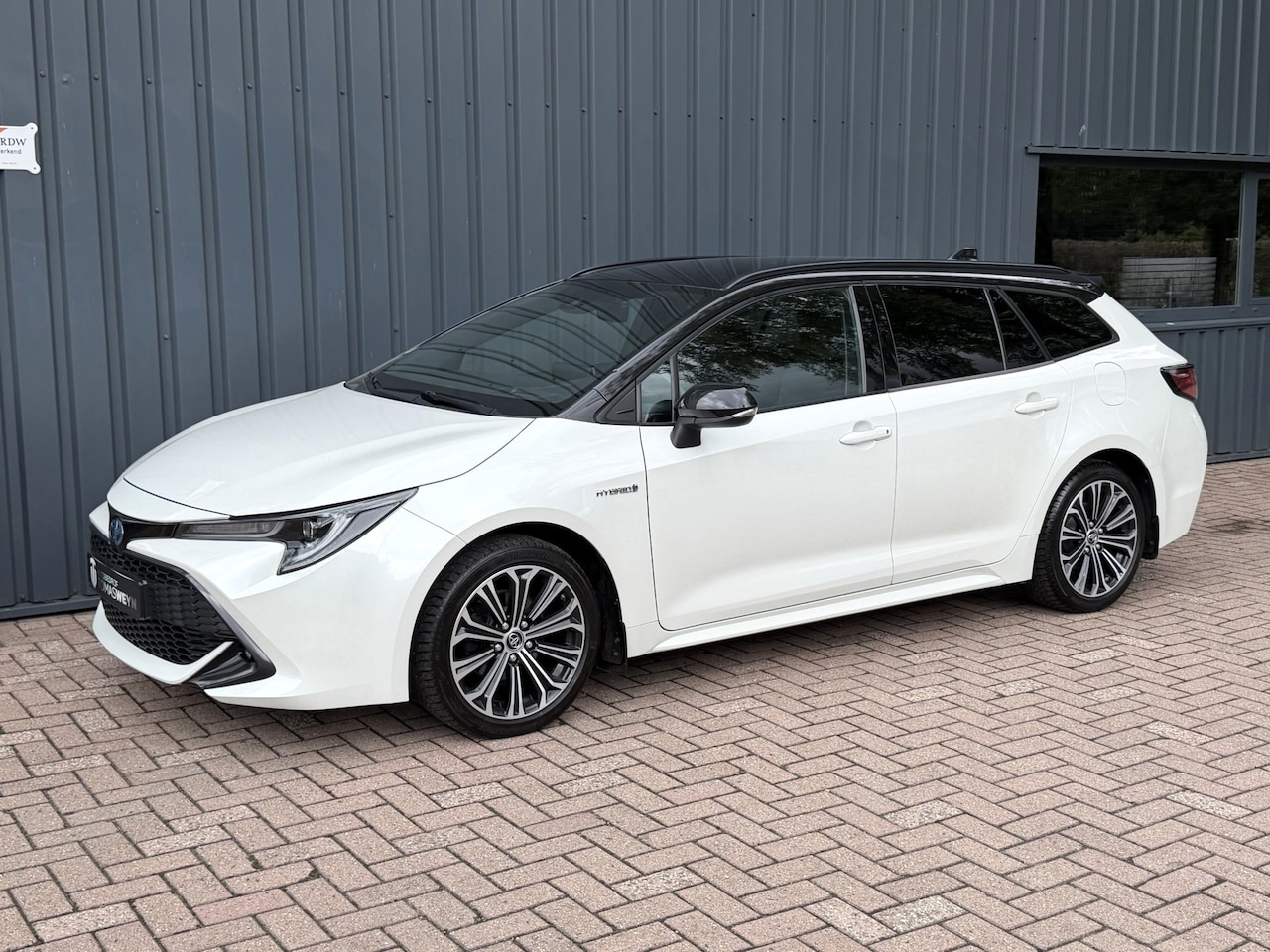 Toyota Corolla Touring Sports - 1.8 Hybrid Executive DEALER OND.!/HEAD UP!/APPLE CARPLAY!/ - AutoWereld.nl