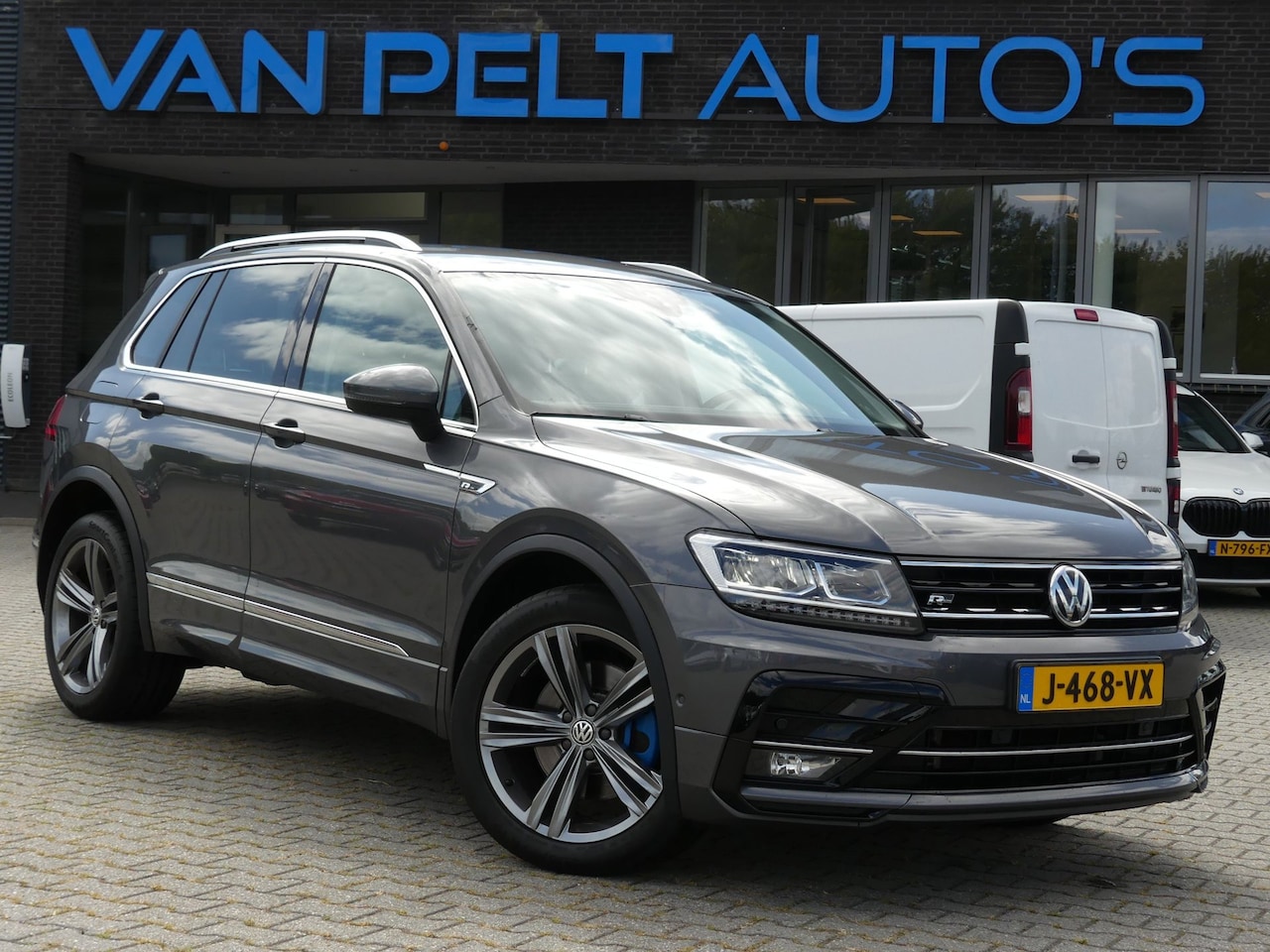 Volkswagen Tiguan - 2.0 TSI 4Motion 180PK DSG Highline Business R - AutoWereld.nl