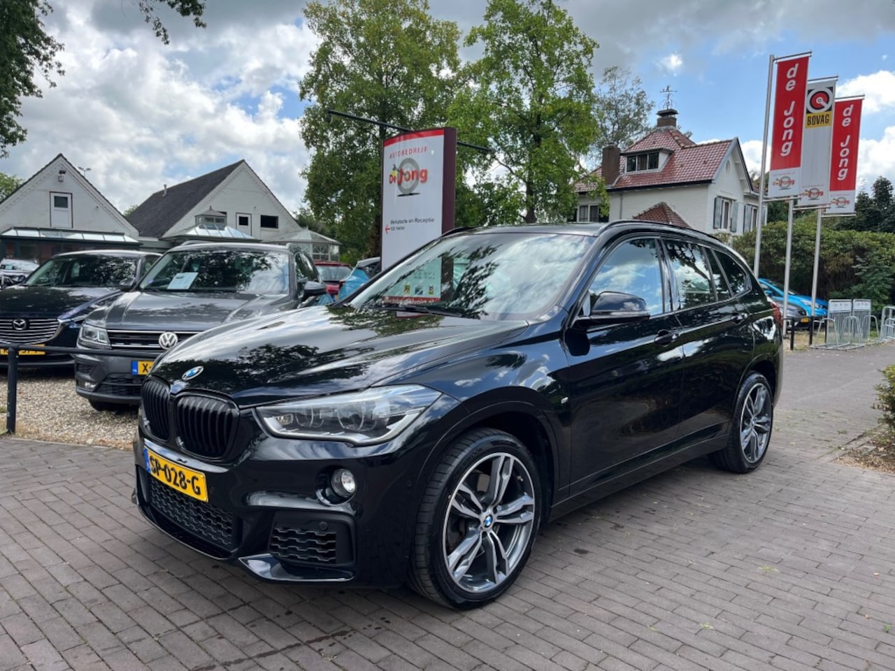 BMW X1 - SDRIVE 20I HIGH EXECUTIVE 192PK AUTOMAAT / PANODAK / HEAD-UP / LEDER / NAVI / TREKHAAK AFN - AutoWereld.nl