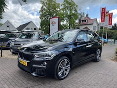 BMW X1 - SDRIVE 20I HIGH EXECUTIVE 192PK AUTOMAAT / PANODAK / HEAD-UP / LEDER / NAVI / TREKHAAK AFN