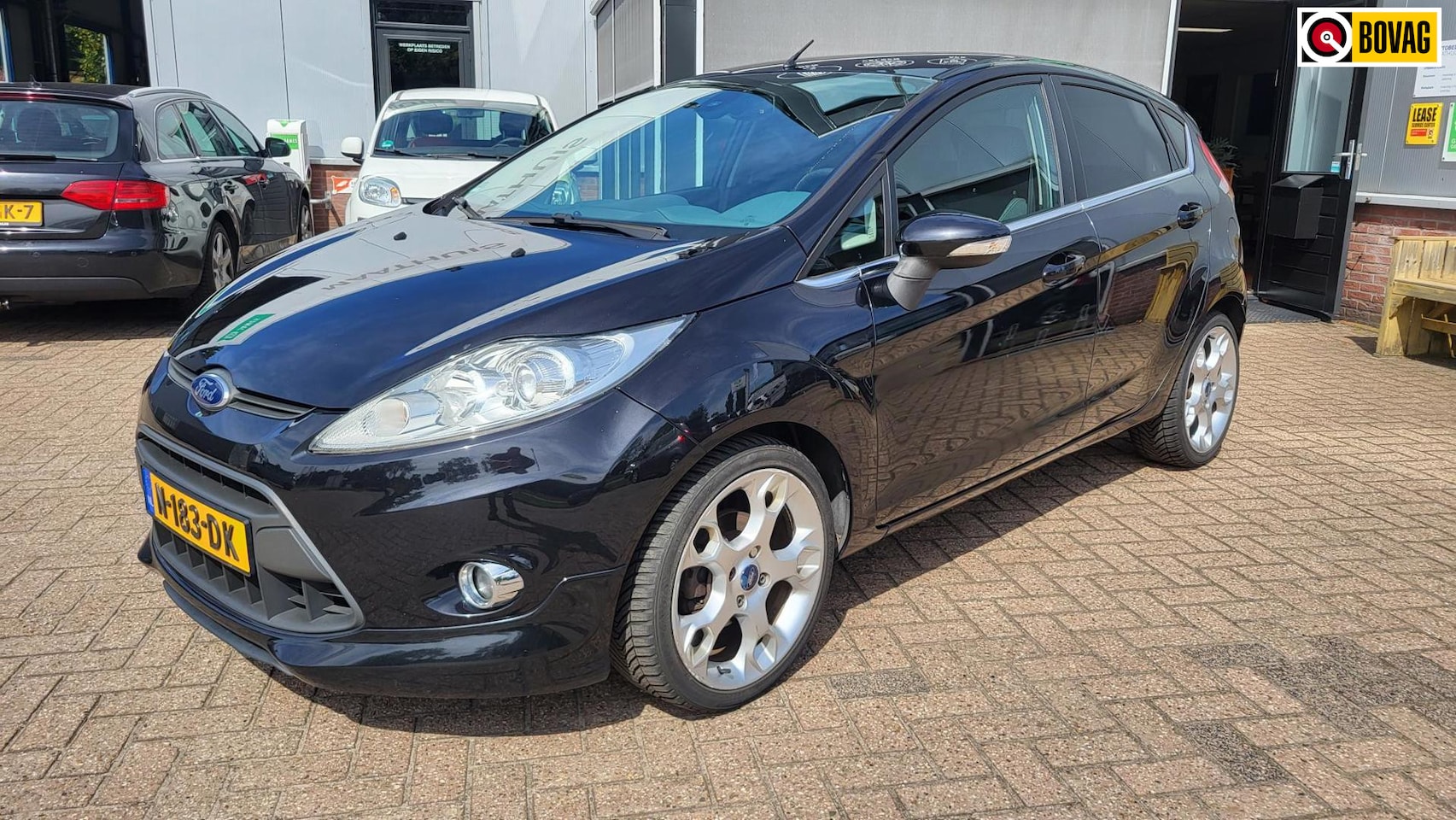 Ford Fiesta - 1.6 Ghia 5 deurs - AutoWereld.nl