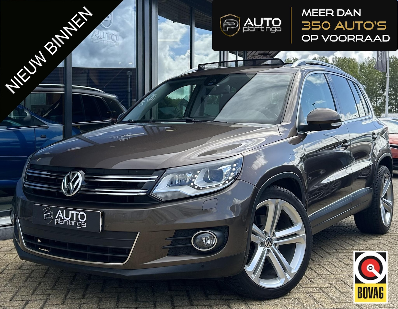 Volkswagen Tiguan - 2.0 TSI Sport&Style 4Motion 179PK | AUTOMAAT | NL AUTO | PANO | Wegklapbare Trekhaak | Sto - AutoWereld.nl