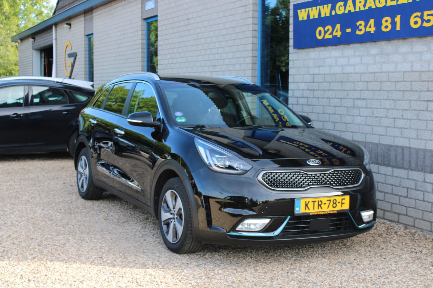Kia Niro - 1.6 GDi PHEV DynamicLine Clima Navi 1/2 Leder afn. trekh. - AutoWereld.nl