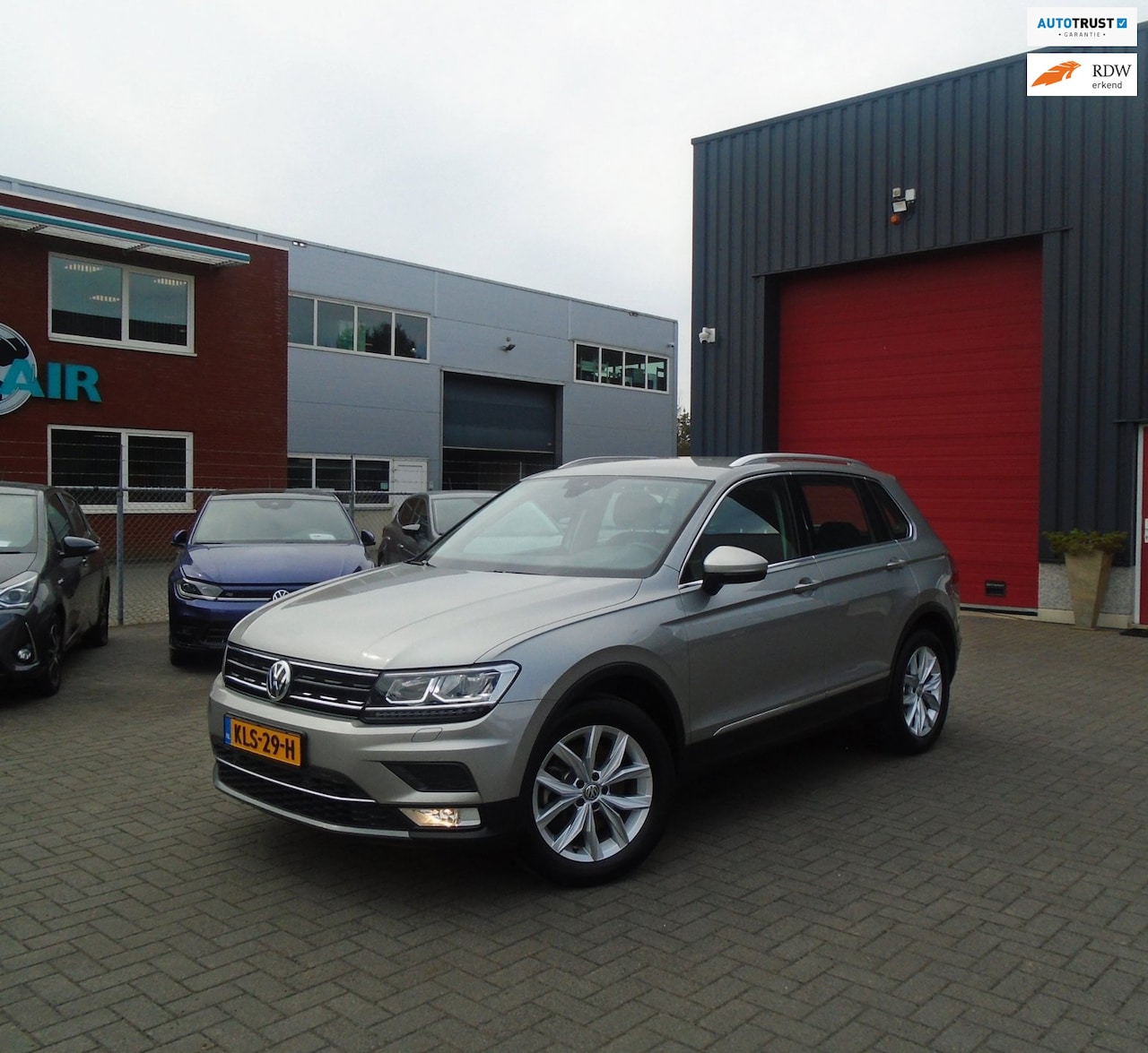 Volkswagen Tiguan - 2.0 TSI 4Motion Highline 2.0 TSI 4Motion Highline,Automaat,Trekhaak - AutoWereld.nl
