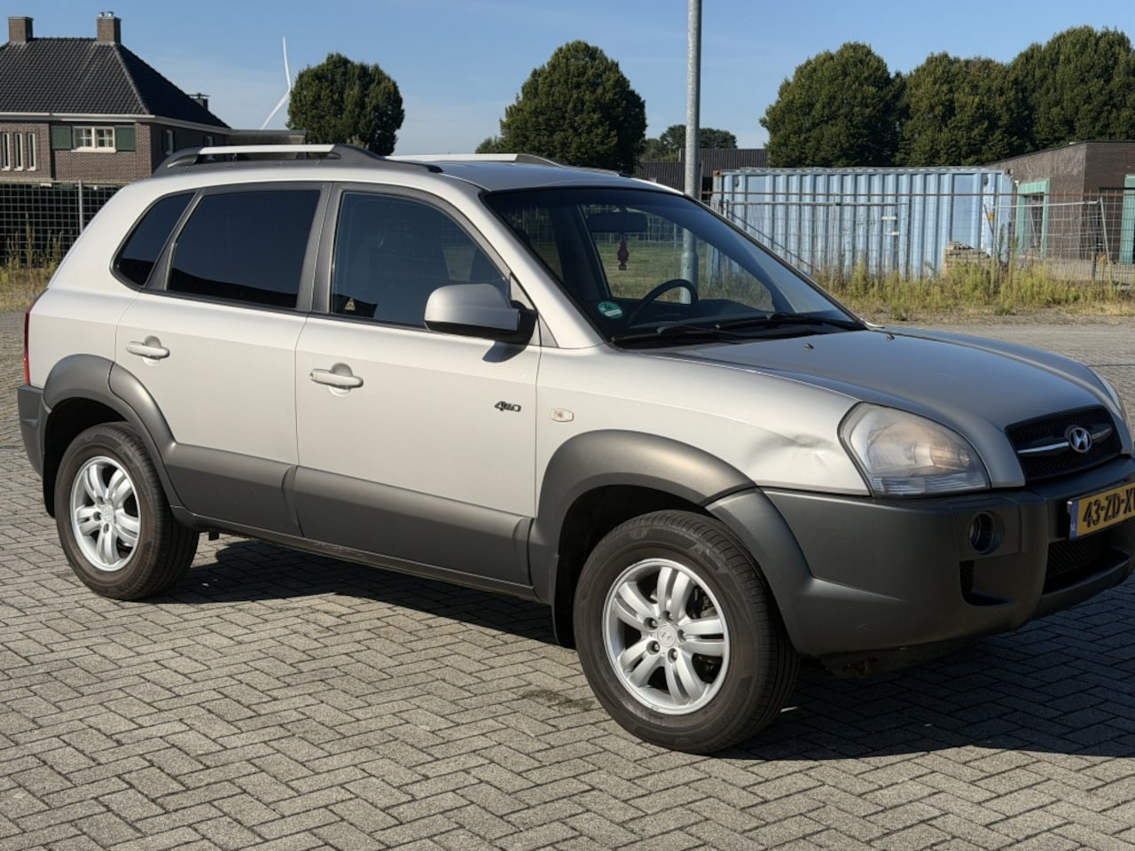 Hyundai Tucson - 2.0i 4WD Style Airco - AutoWereld.nl