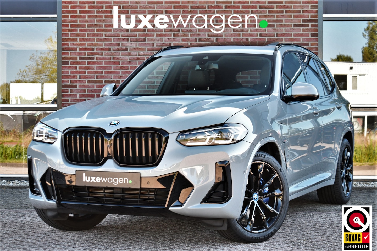 BMW X3 - xDrive30e M-Sport Pano Trekh HUD E-zetels 360-cam Gesture - AutoWereld.nl